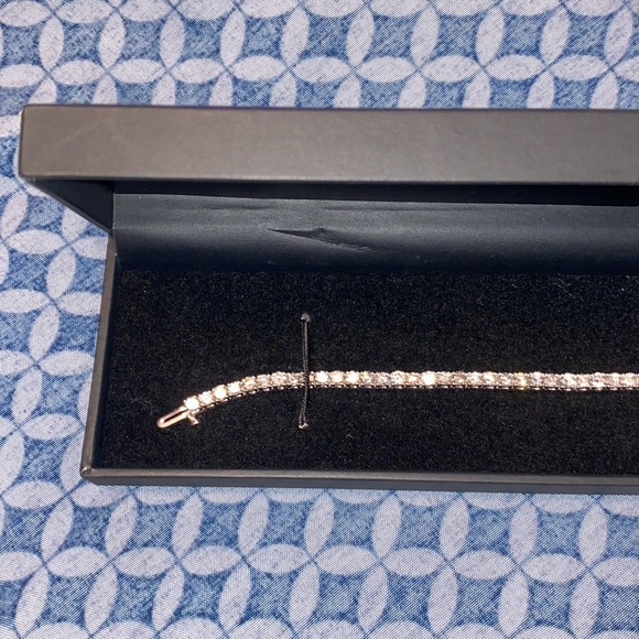 diamond tennis bracelet is set in elegant 14k white gold. - Picture 7 of 10
